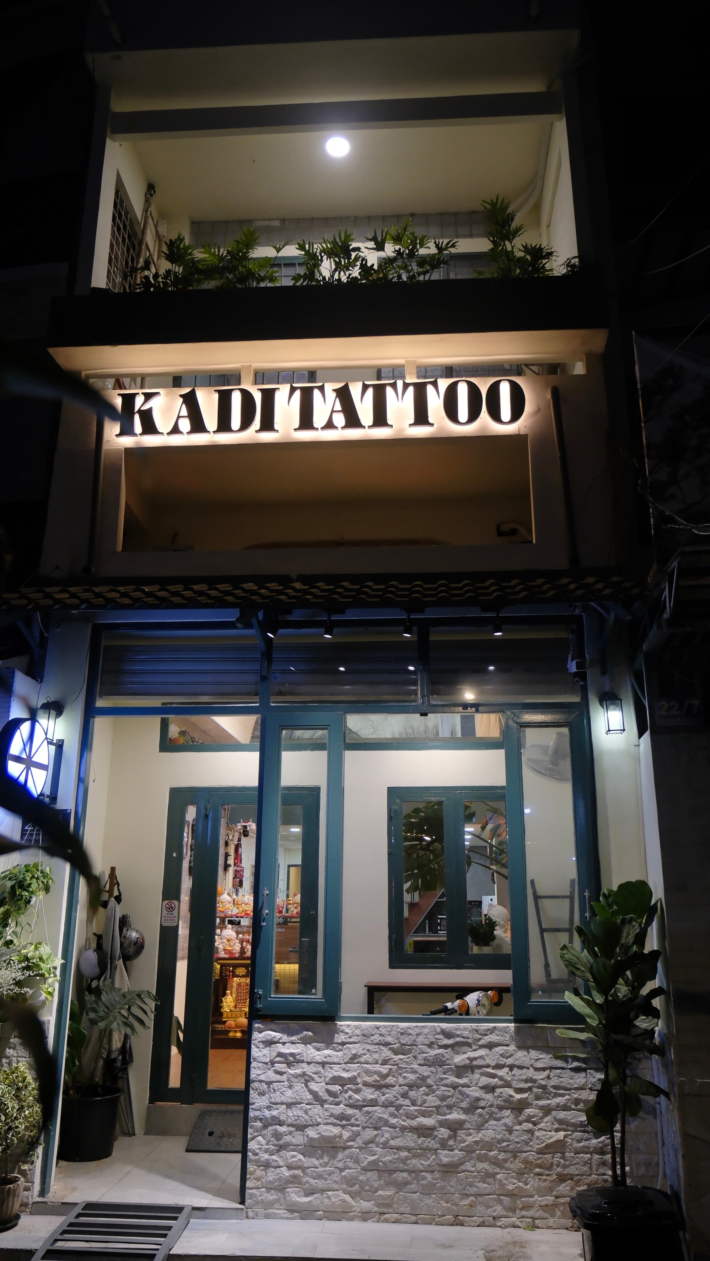Kadi Tattoo Studio Exterior at Night